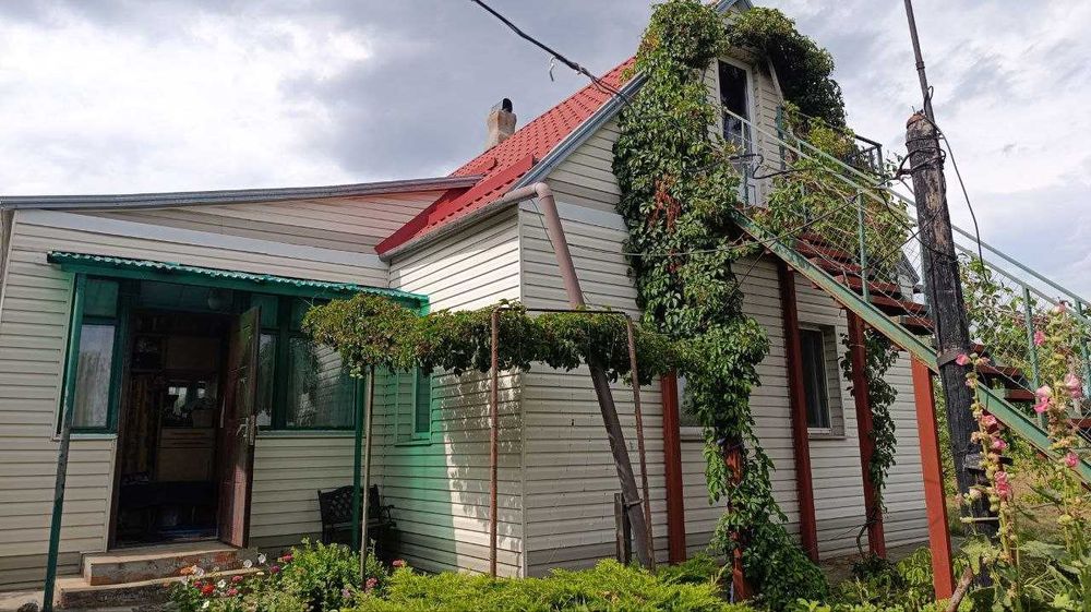 Продам дом в Подгородном с отличным участком