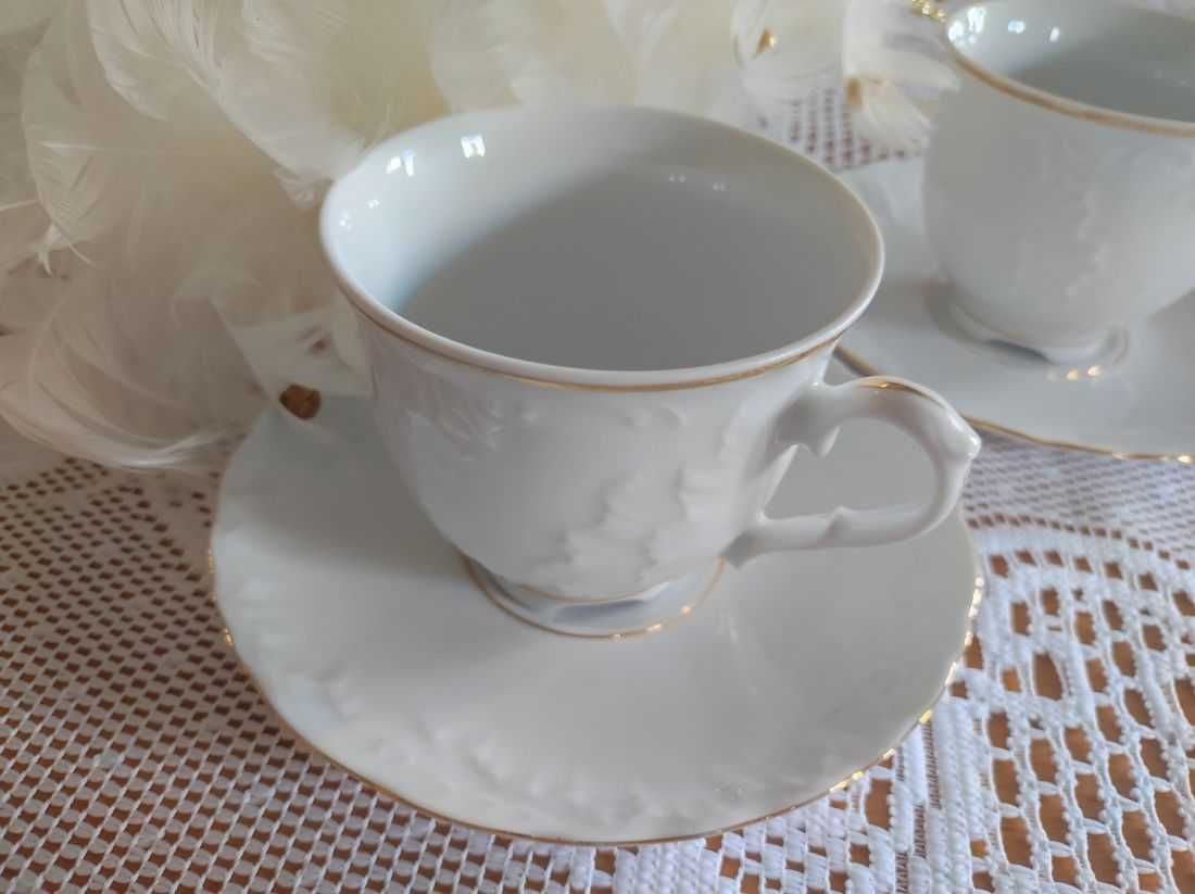 Filiżanki porcelanowe spodki ćmielów rococo złocone ręcznie  malowane