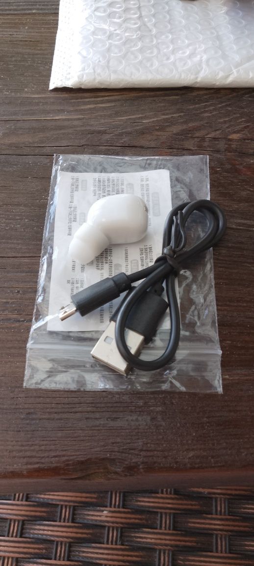 Słuchawka bluetooth,biała,nowa.