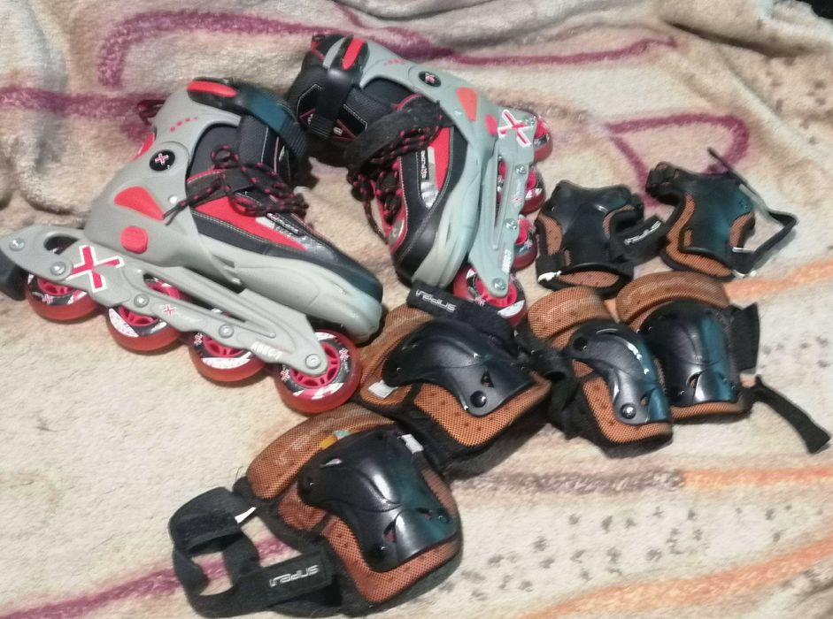 Роликовые коньки и защитные щитки