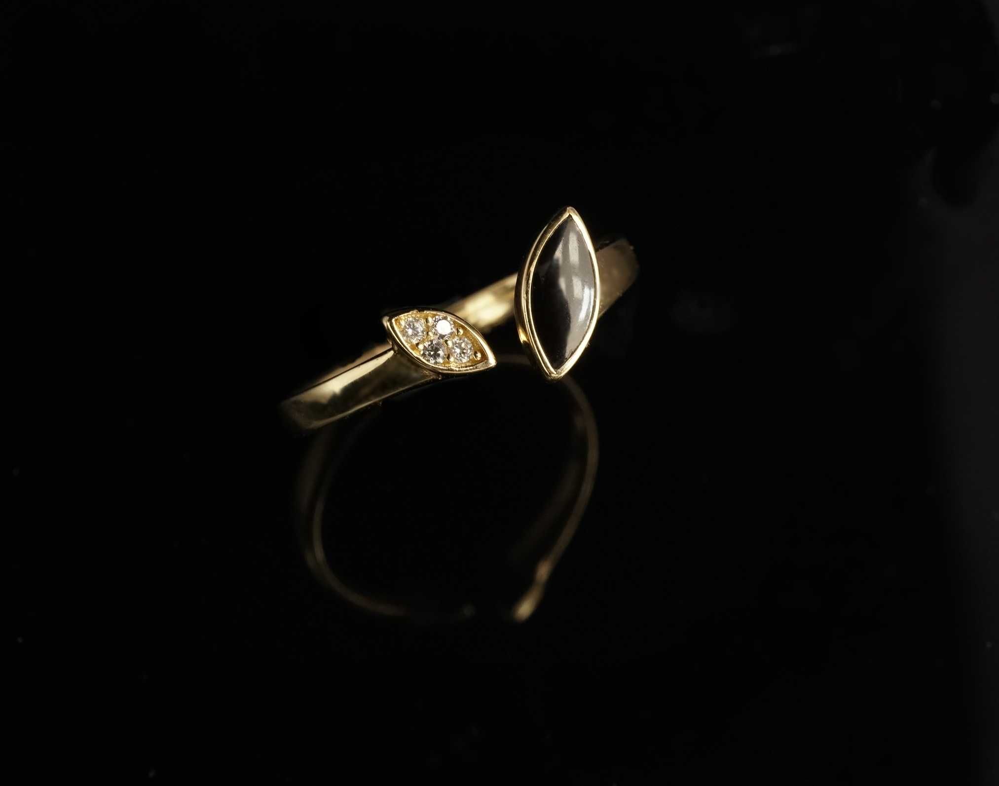 Złoto 585 - złoty pierścionek z cyrkoniami. Rozmiar 17
