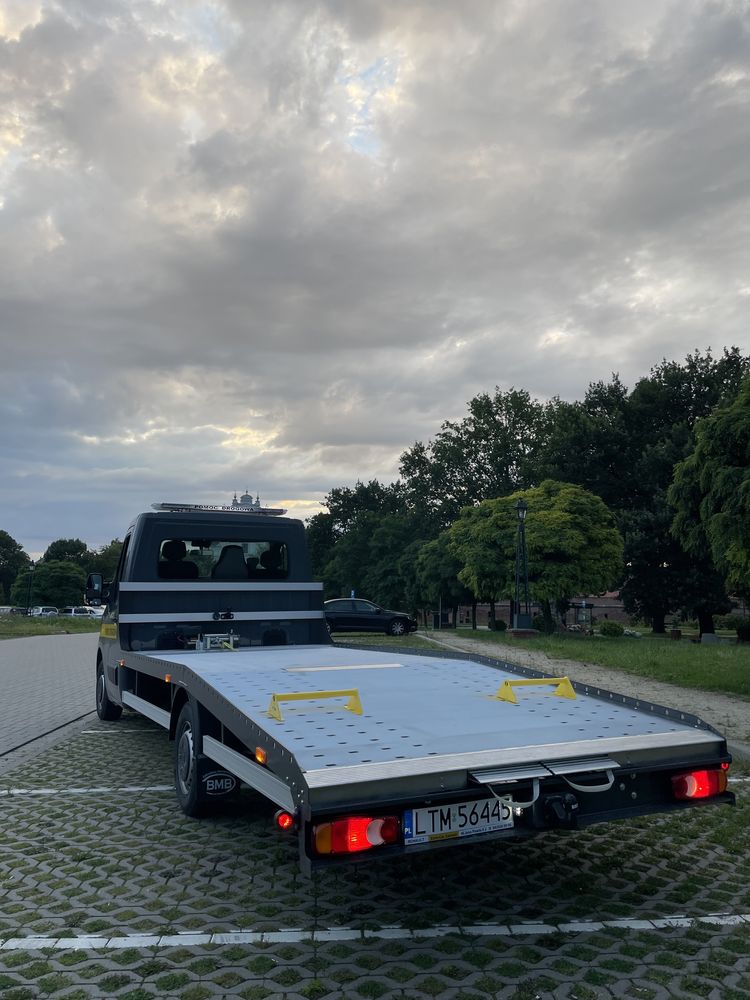 Pomoc drogowa-laweta-holowanie-usługi transportowe