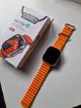 Smartwatch pomarańczowy nowy