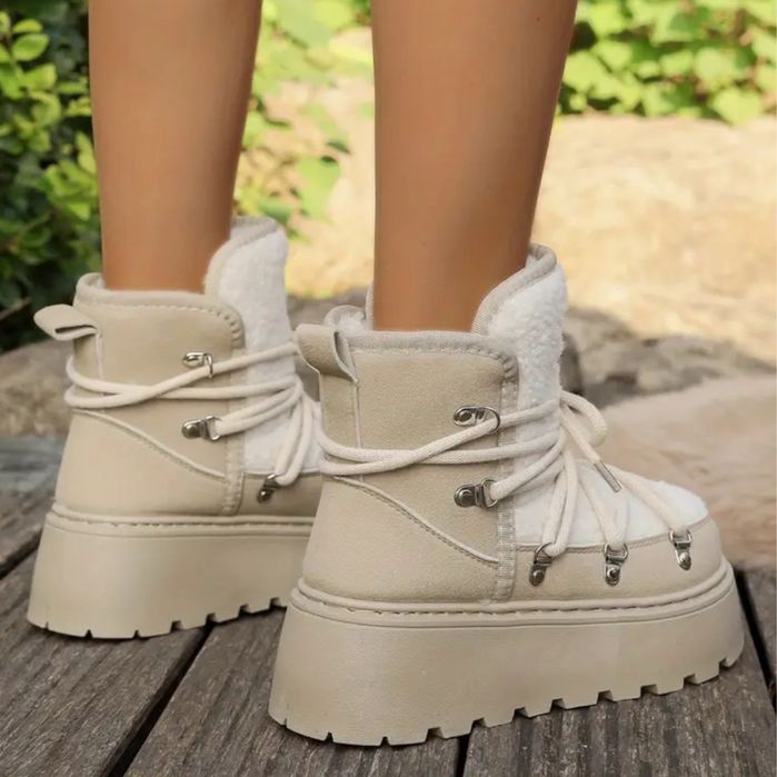 Зимові чоботи на високій подошві