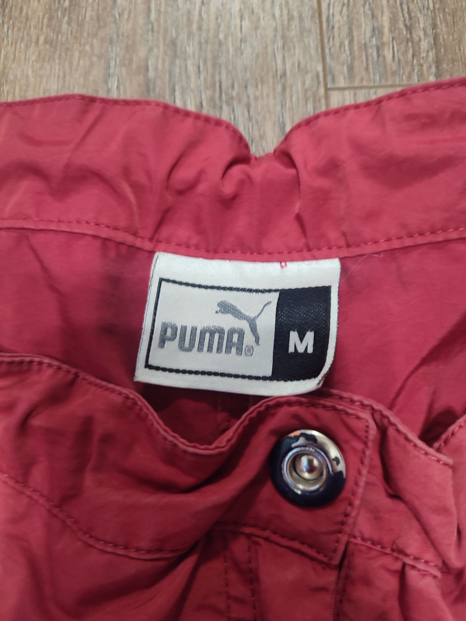 червоні штани puma