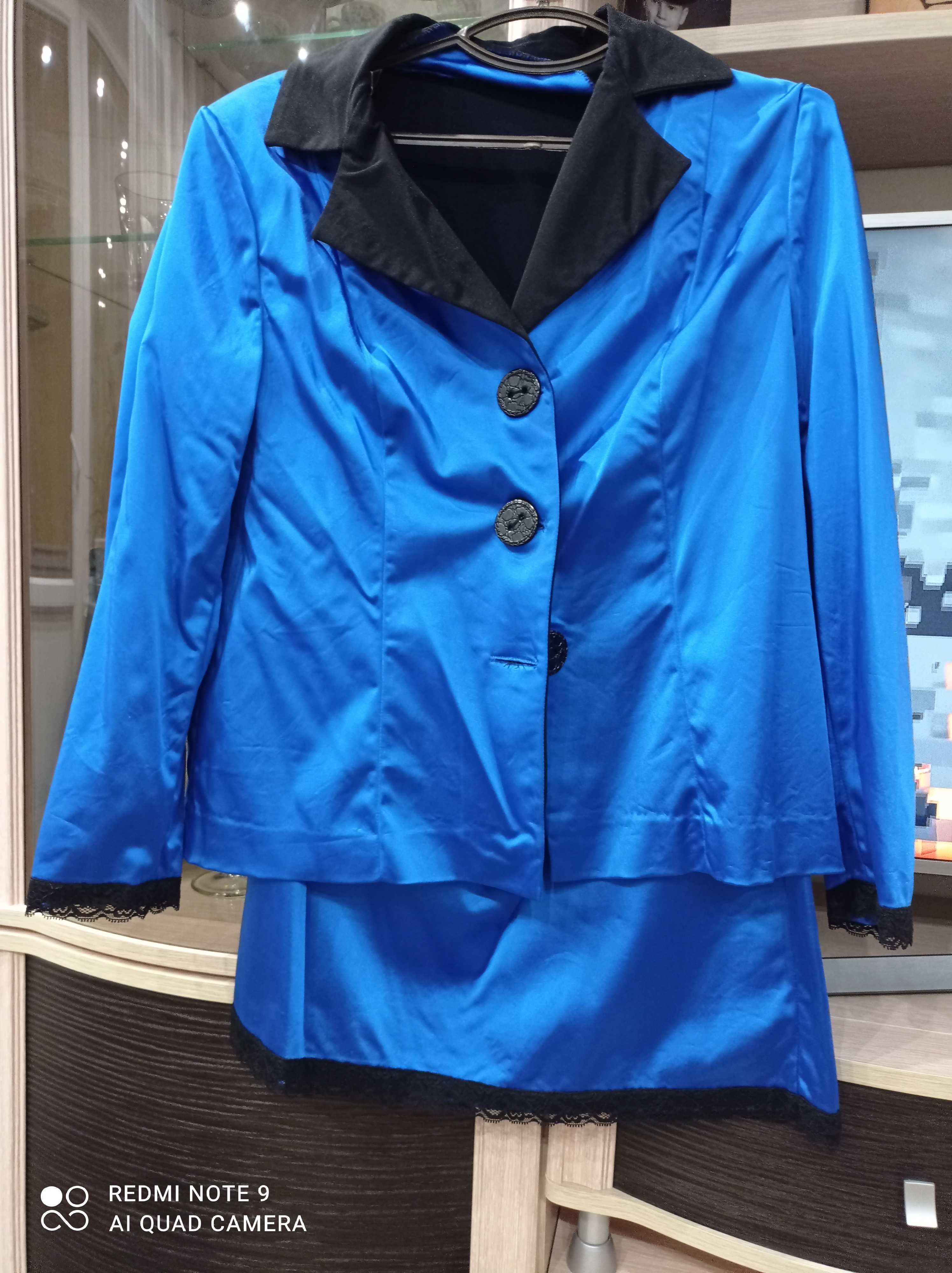 Женский костюм синего цвета