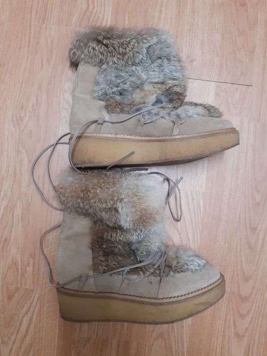 Botas de neve em pele  - em estado novo