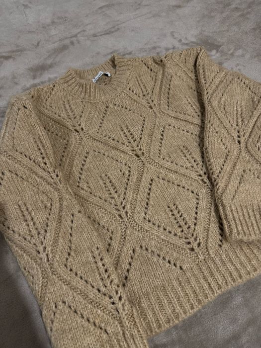 Вʼязаний светрик пшеничного кольору