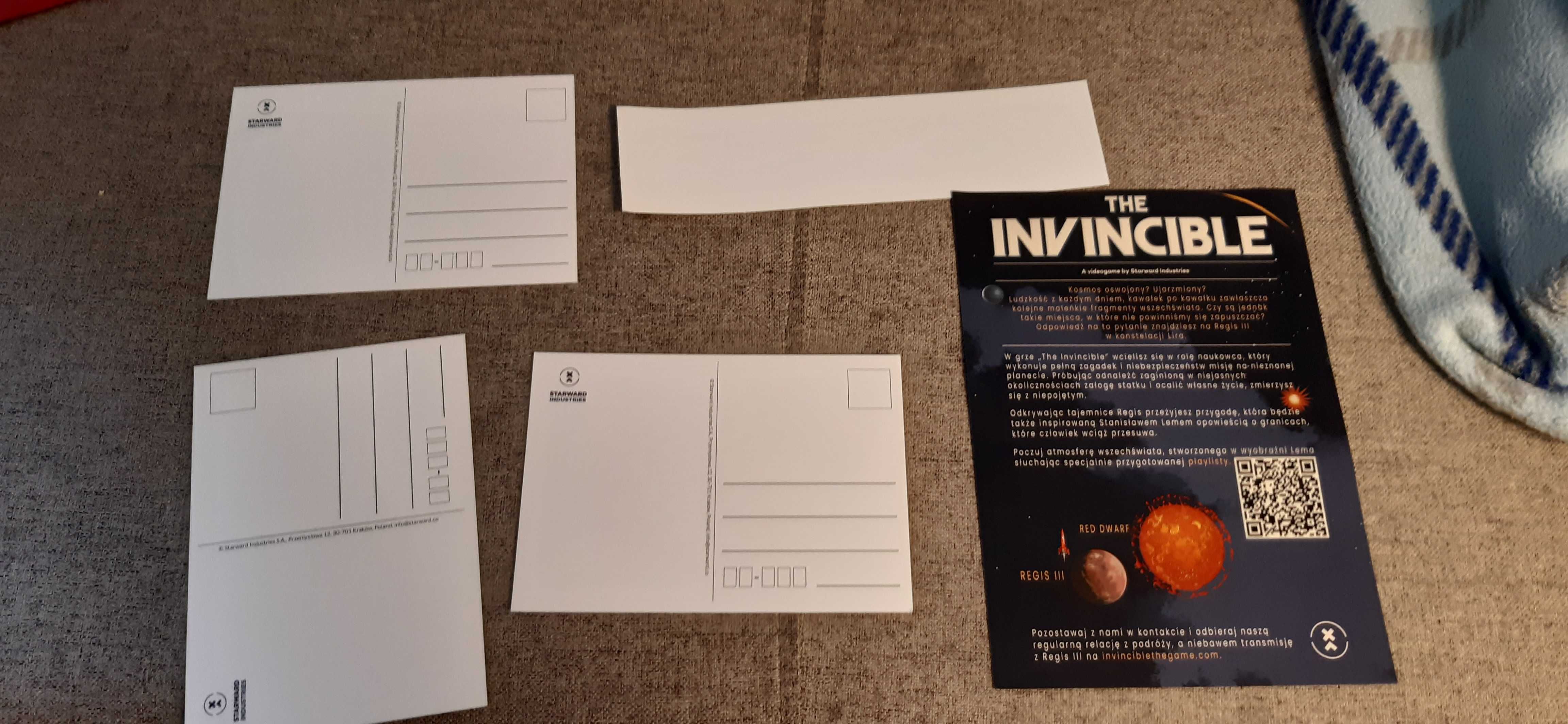 zestaw 66 gadżety z gry the invincible , kartki pocztowe art i ulotka