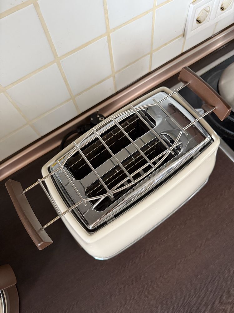 Тостер Delonghi