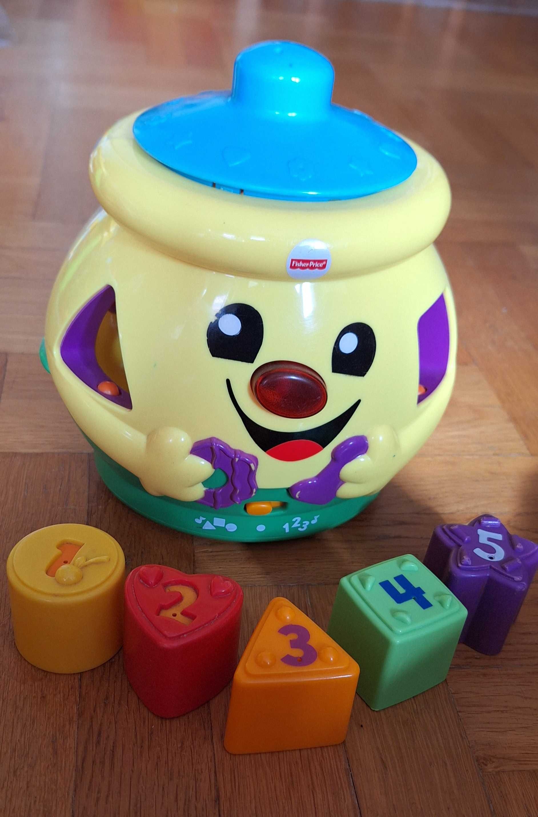 Garnuszek na klocuszek fisher price sorter