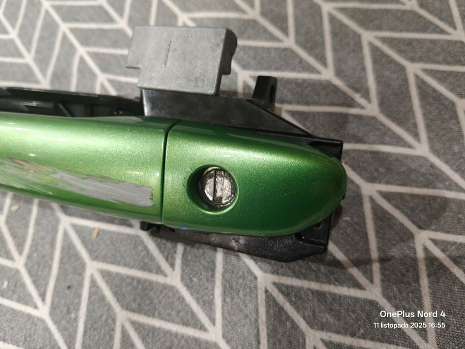 Klamka lewa przód przednia zielona Mazda 2 DE 07-10