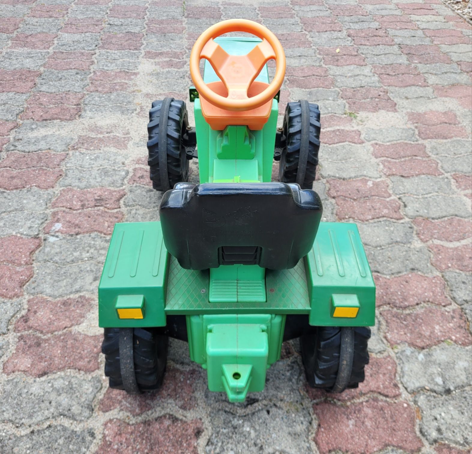 Zielony traktor na pedały zabawkowy