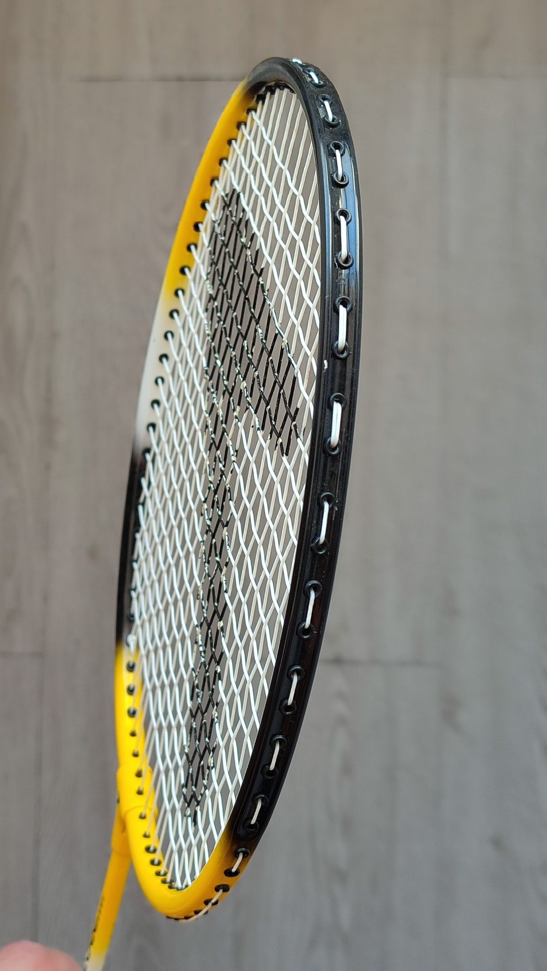 Raquete de badminton