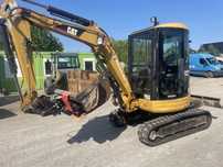 Minikoparka Cat 303, sprowadzona