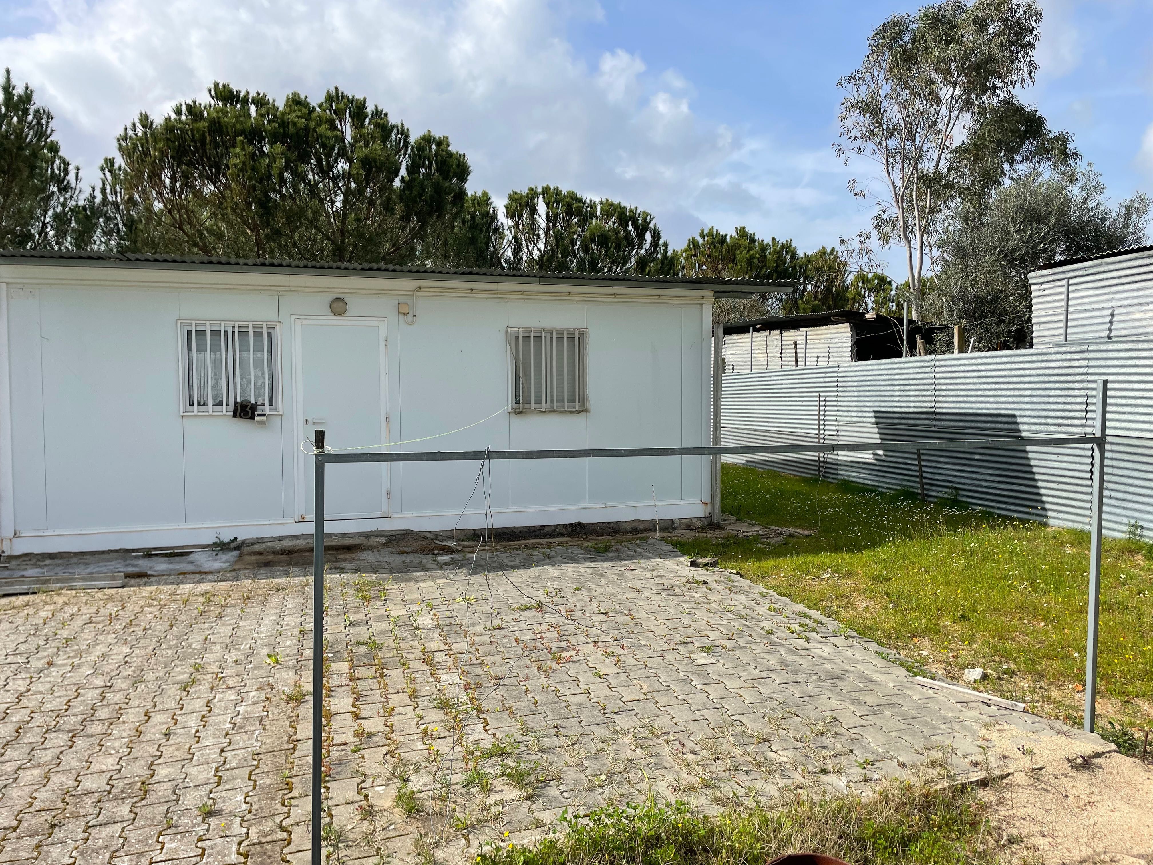 Terreno com casa modular