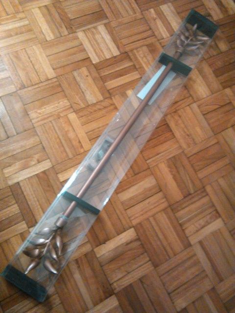 Varão cortinado de cor bronze