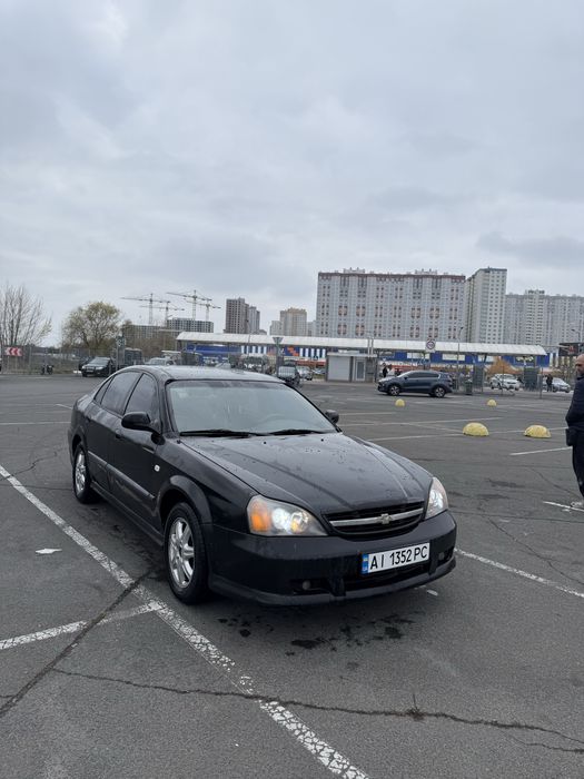 Шевроле еванда автомат шикарная комплектация