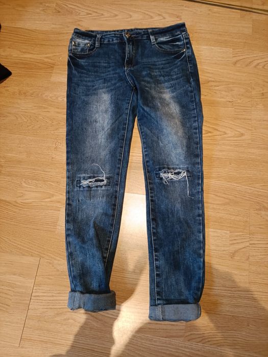 Spodnie jeansowe z przetarciem na kolanach 40 L elastyczne jeansy