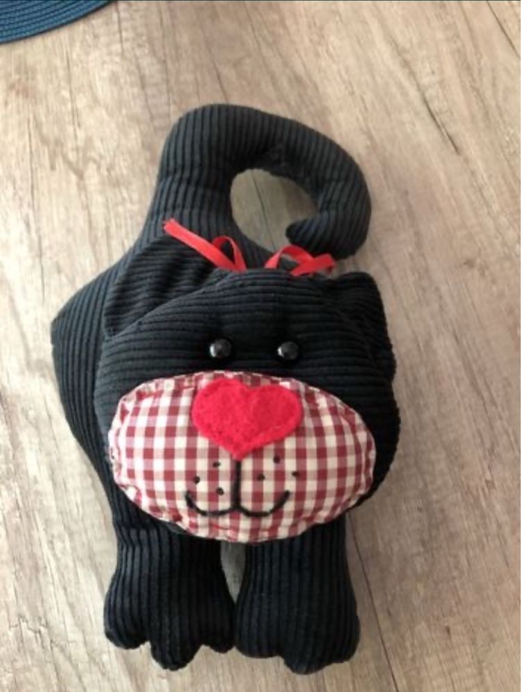 Kot odbijak odbojnik na klamkę drzwi