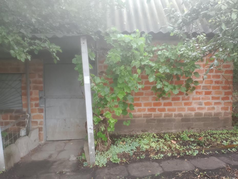 Земельна ділянка з будинком