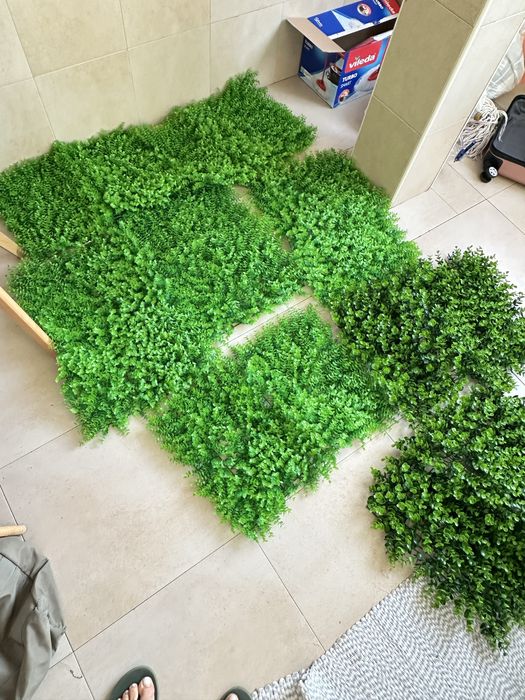 Painel de planta artificial.