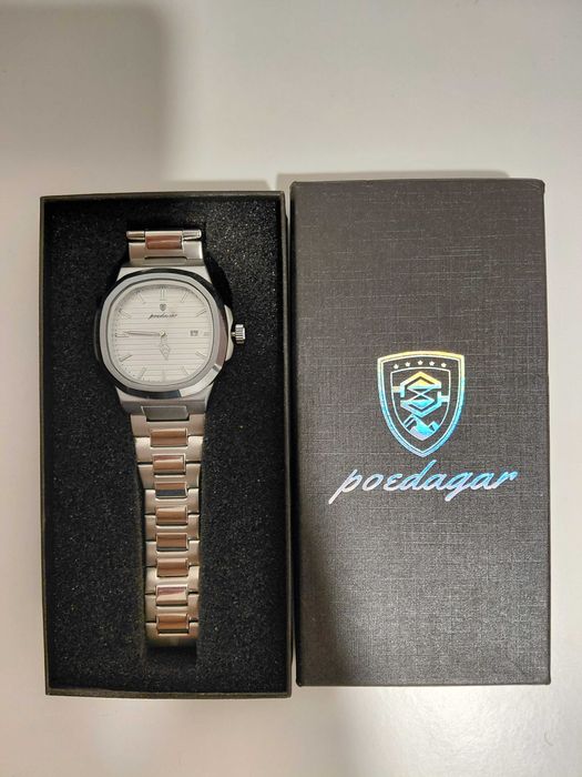 Relógio  poedagar nautilus novo