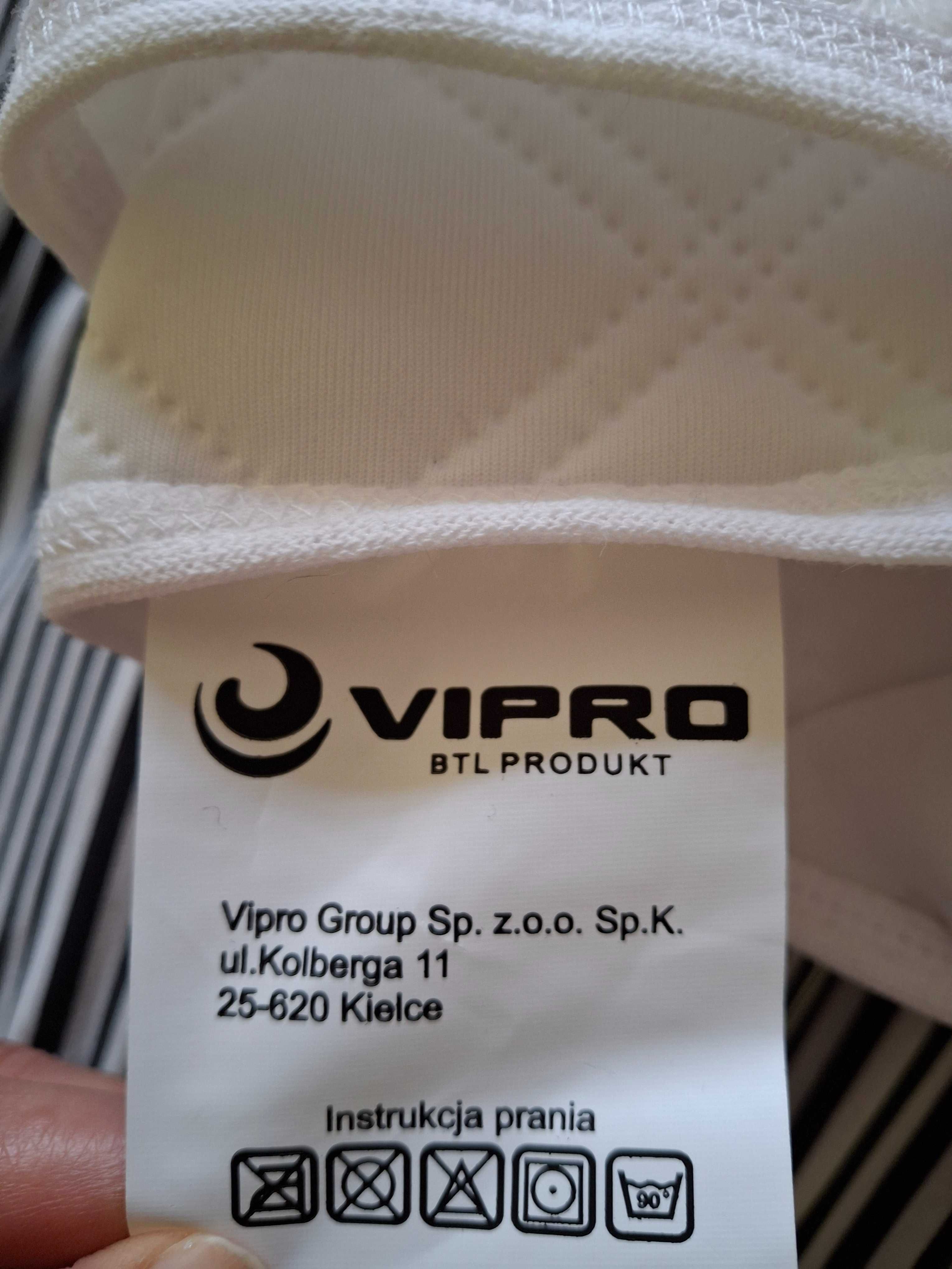 Materiałowa podkładka na łóżko
