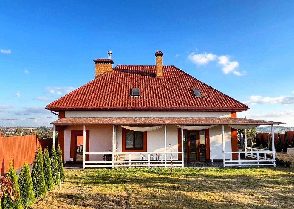 Жилий дім200м2+0,25га.Камін,сонячні панелі,електро/твердопалевний котл