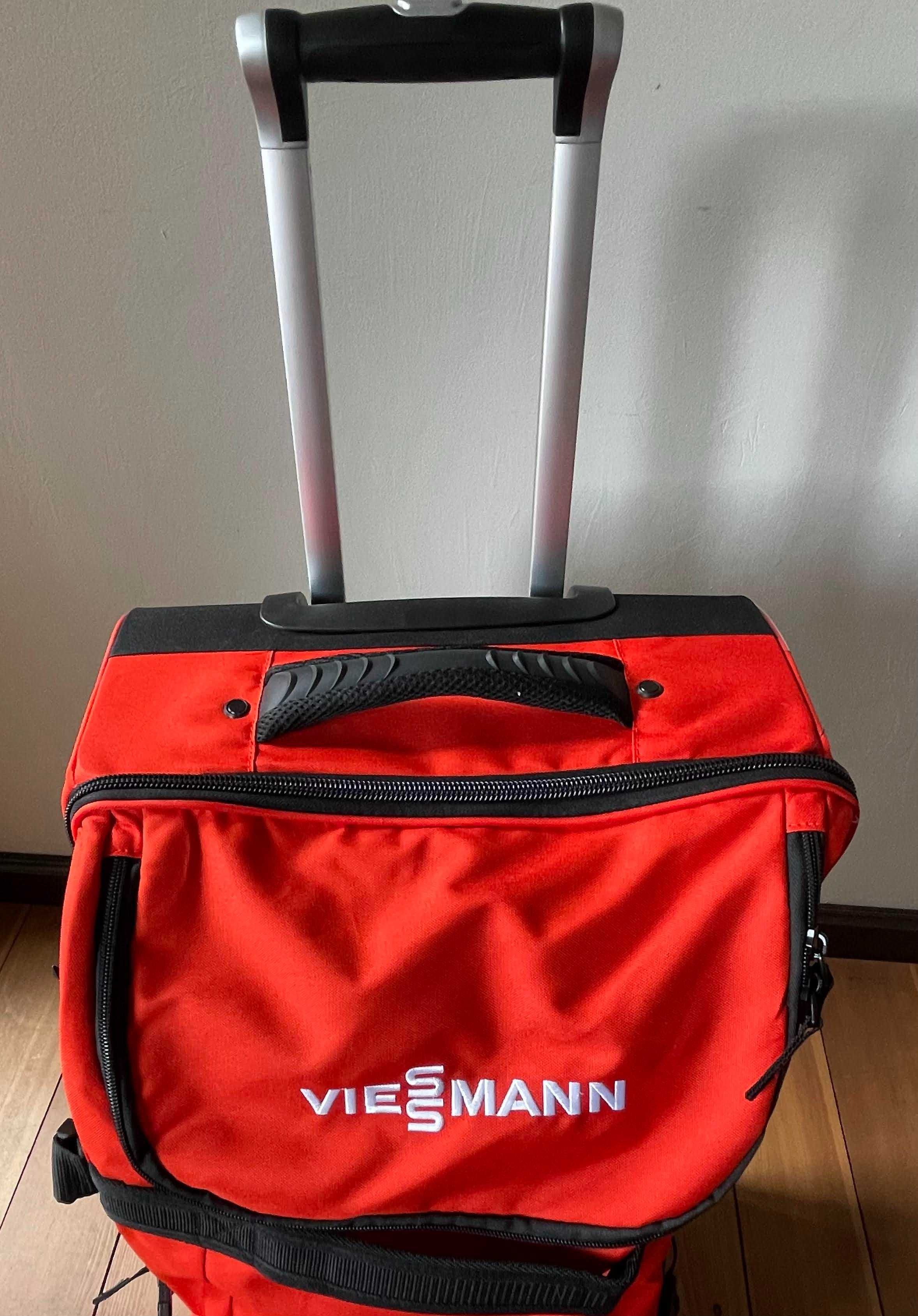 nowa duża walizka na kółkach firmowana przez VIESSMANN
