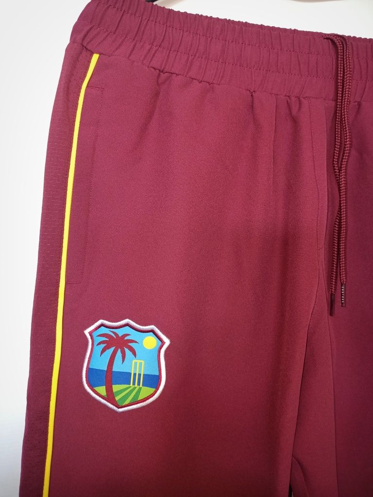 Castore spodnie dresowe męskie r.M 14-lat