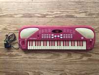 Piano elétrico para criança