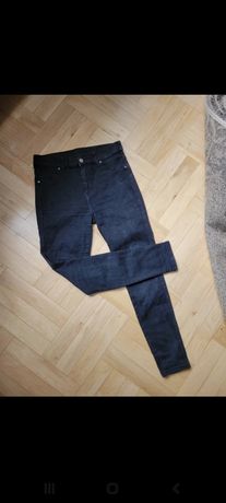 Czarne jeansowe spodnie damskie z wysokim stanem rozmiar S 36