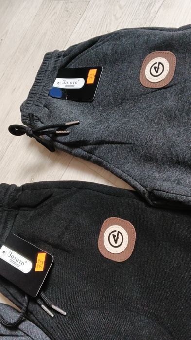 Теплі спортивні штани на флісі для хлопчика 128-134