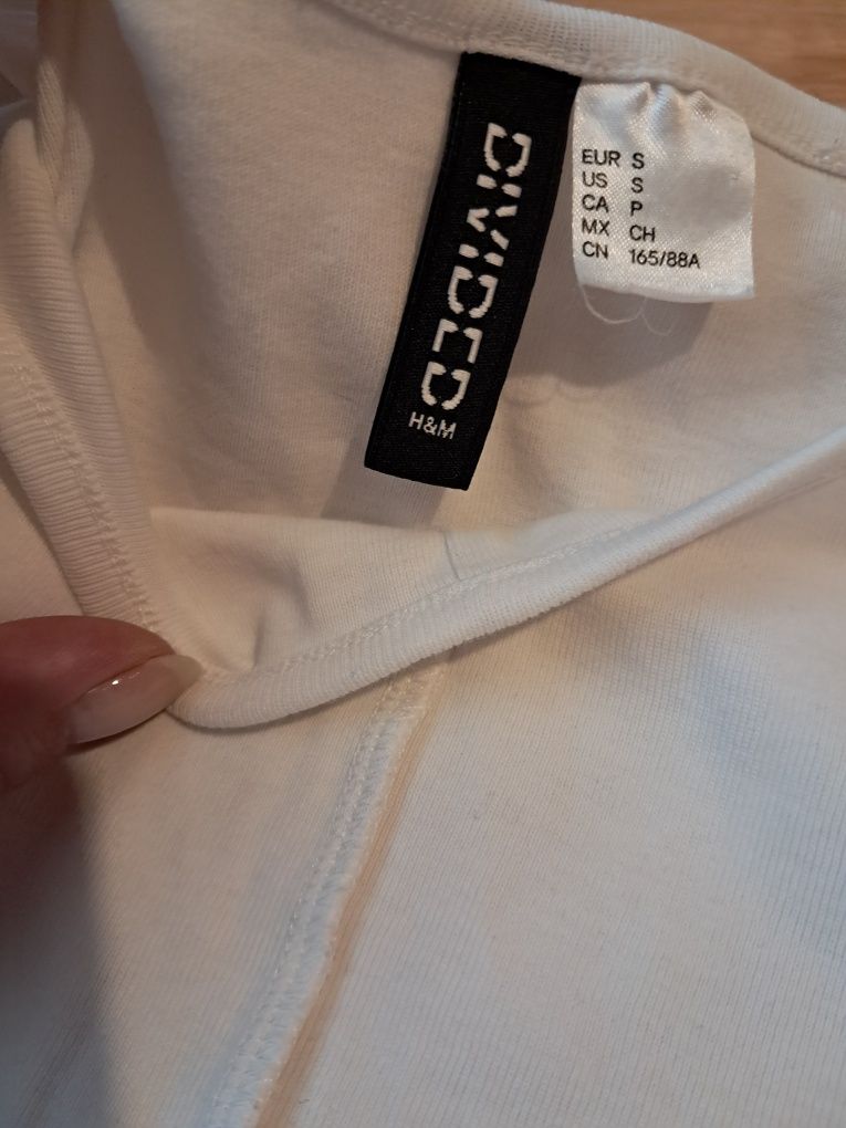 Biały top z przeszyciami H&M