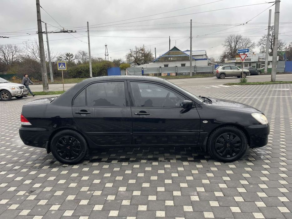 Mitsubishi Lancer 9 1.6 Газ Автомат