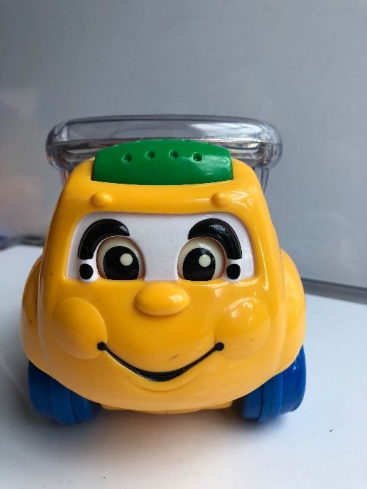 Samochodzik FISHER PRICE z kulkami, Ciężarówka CAT dźwięk i światło