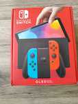 Nintendo Switch OLED + 7gier + kontroler + kartą pamięci 256 + online.