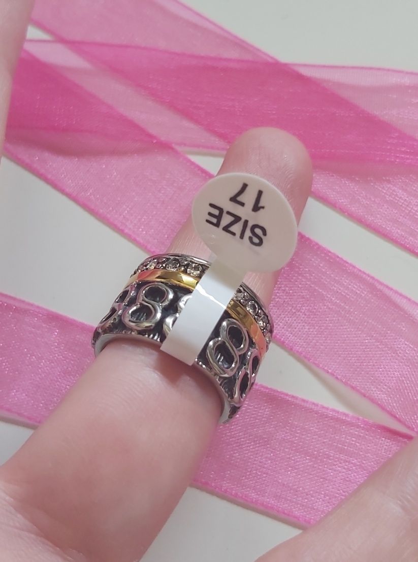 Anel bicolor, em aço, com zirconias e infinitos. T17