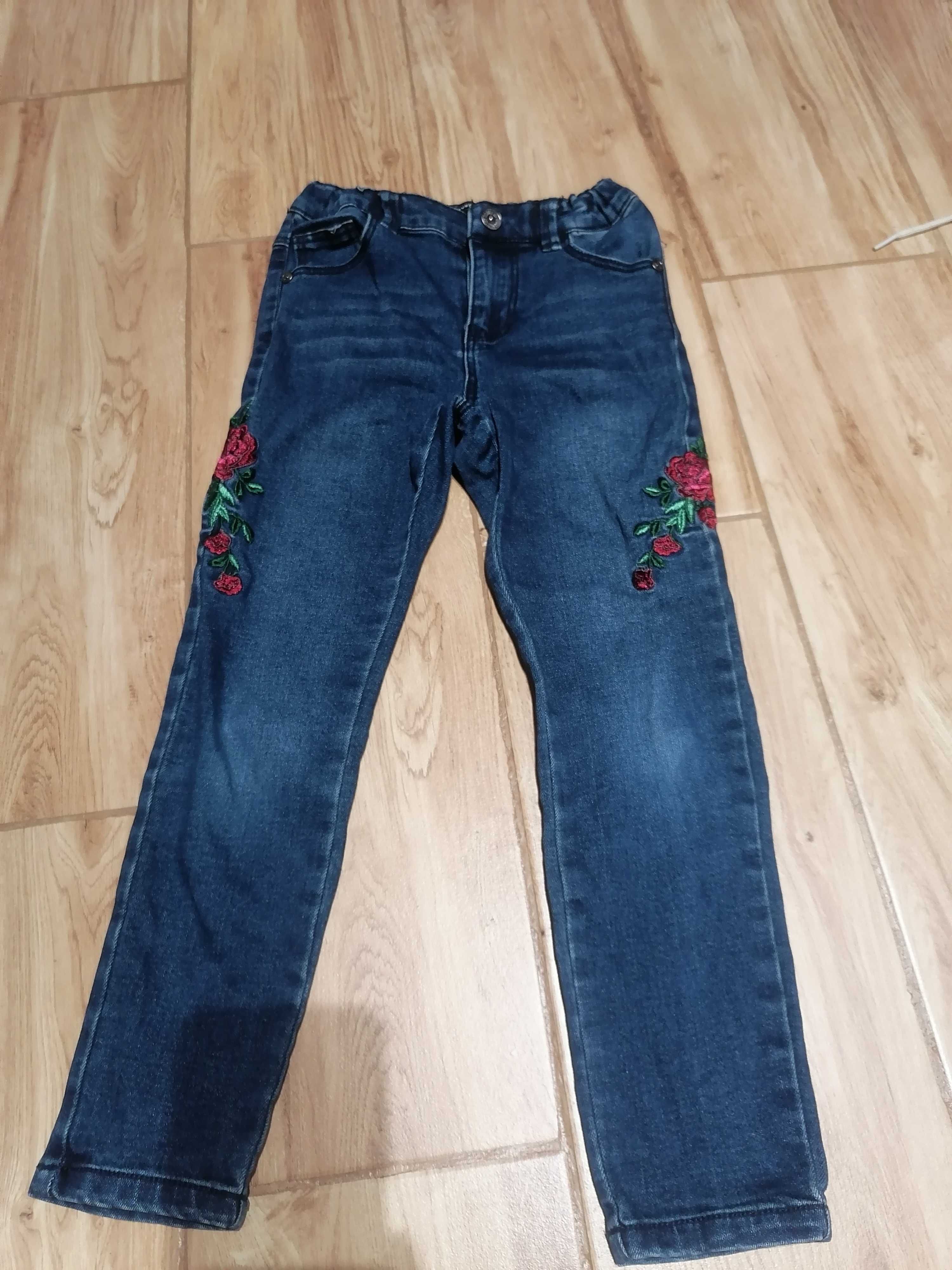 Spodnie jeansowe dziewczynka 116 z haftrm róży