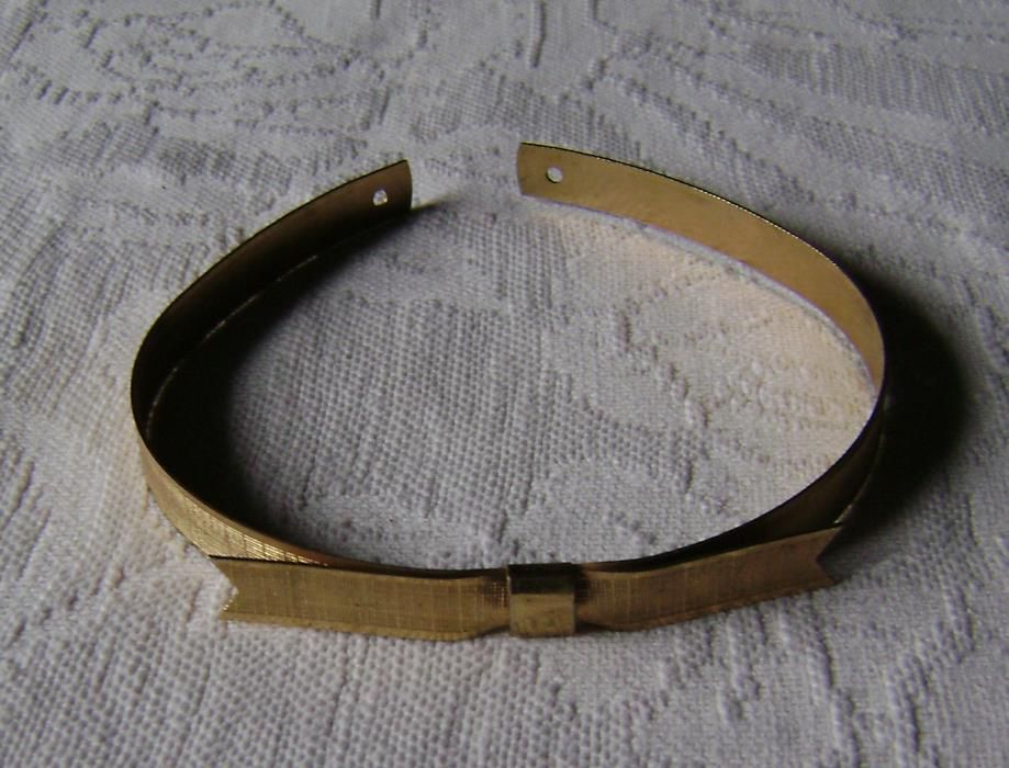 Bandolete em metal - antiga