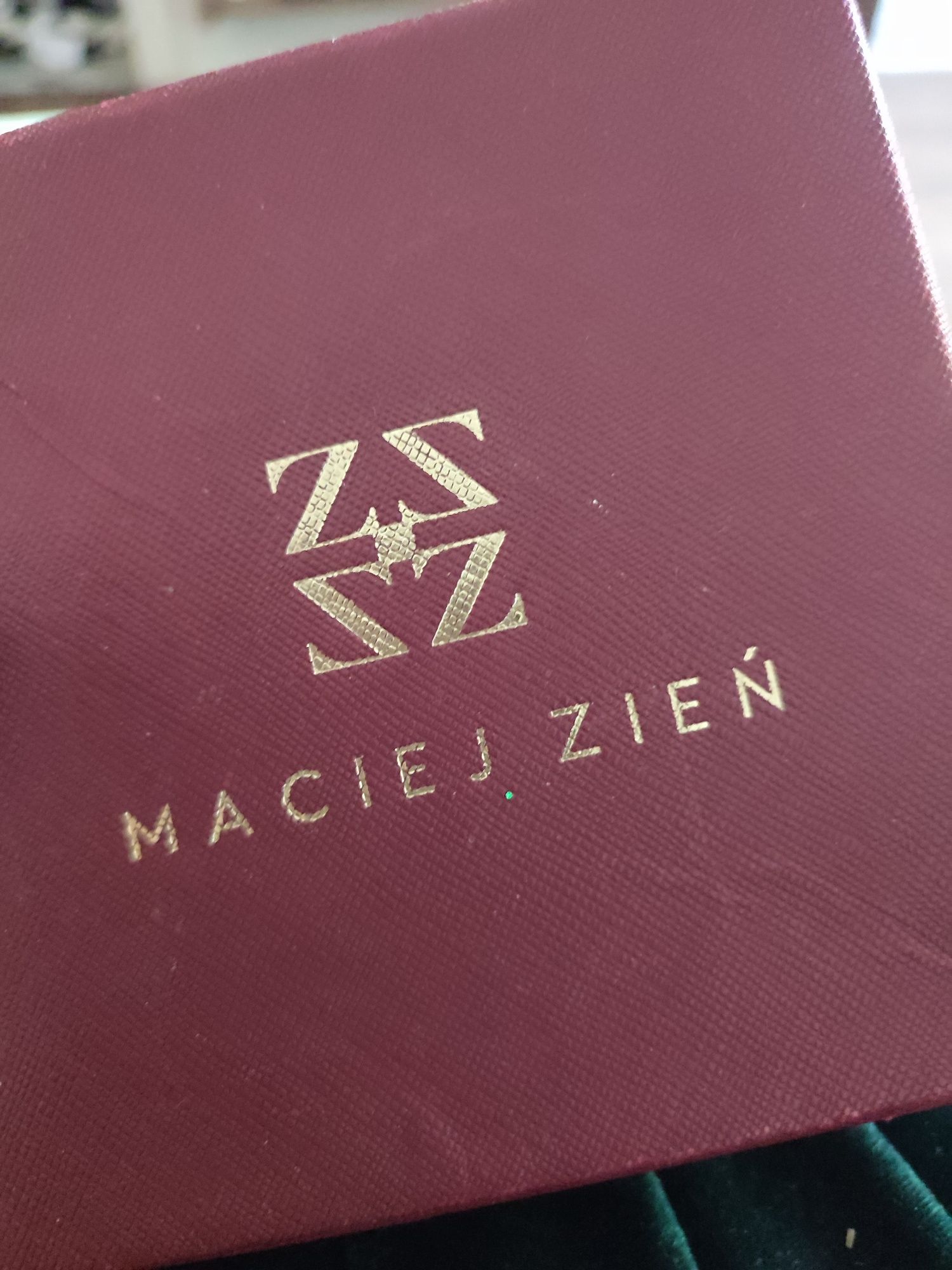 Pasek z złota gwiazdą Maciej Zień