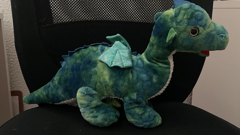peluche dragão como novo