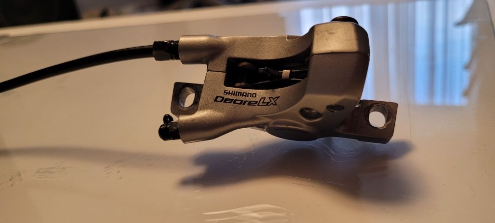 Hamulec hydrauliczny SHIMANO Deore XT / LX przedni