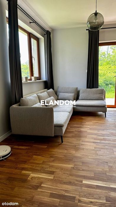 Elegancki dom w zabudowie bliźniaczej z ogródkiem