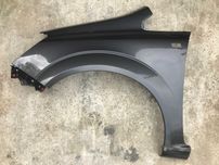Ліве крило Opel Zafira B Z177, Z21B, Z157