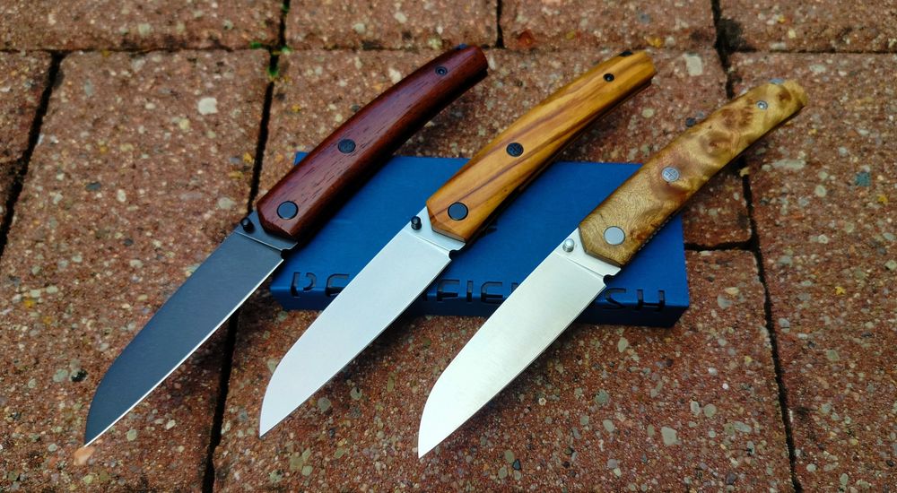 Nóż Petrified Fish 719 drewno