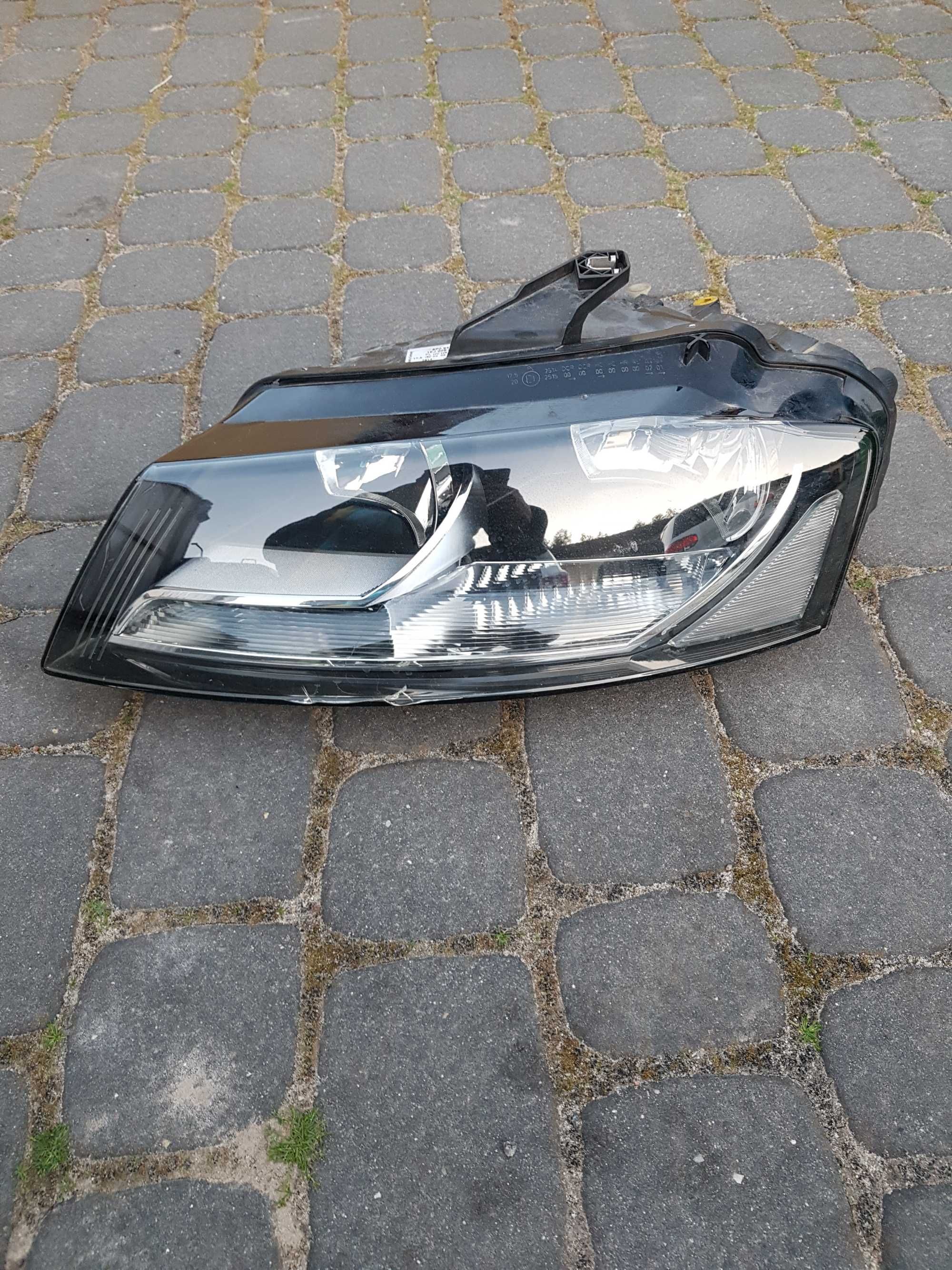 Lampa lewa lewy przod Europa Hella Oryginal Audi A3 8P FL Lift 2010r