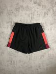 Чорні спортивні шорти Nike Dri-Fit з рожево-фіолетовими вставками