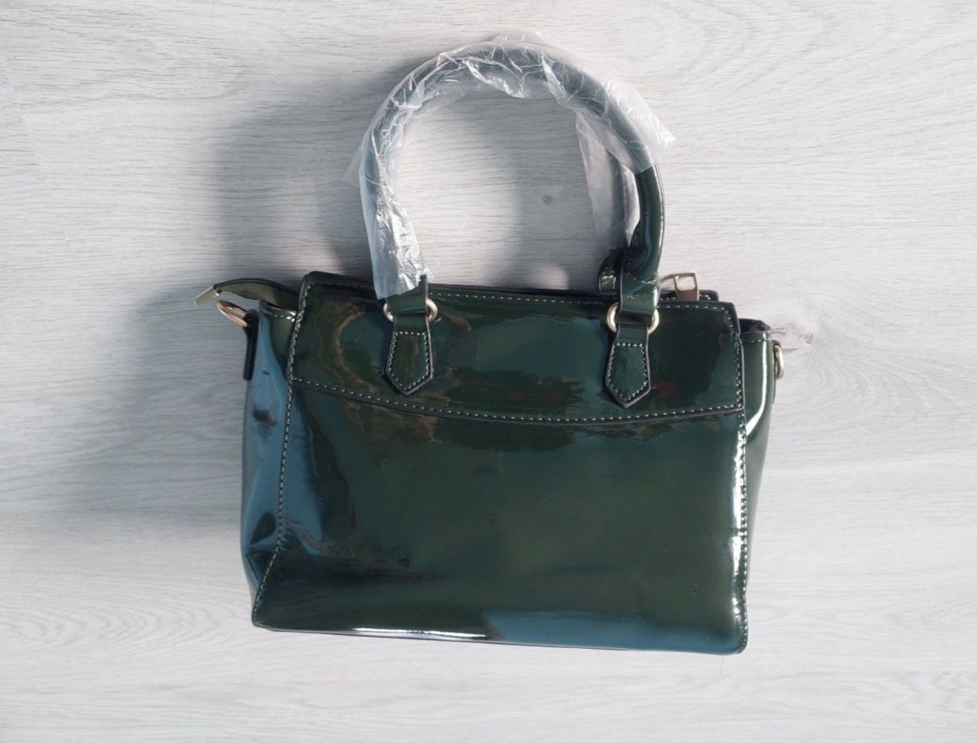 Torebka portfel etui ciemnozielona damska
elegancka trzyczęściowa